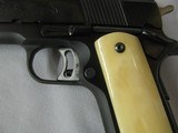 7560 Colt MarkIV 1911 Series 70 GOLD CUP NATIONAL MATCH 45 cal
faux ivory grips, adjustable rear site, 99% condition.--210 602 6360-- - 5 of 9