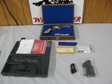7566 Ruger GP 100 in the RARE 327 FEDERAL MAG, 4 inch barrel, 2 sets of grips with inserts. papers PRESENTATION BOX AND RUGER CASE, all papers and cle - 1 of 10