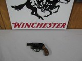 7590 Smith Wesson model38 Airweight, 38 special with 2 in barrel 5 shot hammerless, snag free, snub nose, walnut medallion grips, just like new 99%