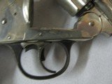 7589 Iver Johnson Arms and Cycle Works 38 smith/wesson caliber 3.25 barrel,top open, nickel 95%, box is poor condition, shells inside are poor condiit - 10 of 12