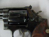 7588 Smith Wesson19-2, 357 Mag 4 inch barrels white outline rear adjustable site, front ramp, drag line, 97% condition, leather holster/pouch carryi - 5 of 10