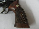 7588 Smith Wesson19-2, 357 Mag 4 inch barrels white outline rear adjustable site, front ramp, drag line, 97% condition, leather holster/pouch carryi - 4 of 10