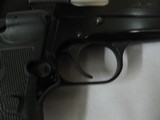 7633 Browning HI Power 9mmmade in Belguim assembled in Portugal, 3 magazines holds 13 rounds each, Crimson trace lazer in grips, original grips incl - 12 of 12