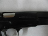 7633 Browning HI Power 9mmmade in Belguim assembled in Portugal, 3 magazines holds 13 rounds each, Crimson trace lazer in grips, original grips incl - 11 of 12