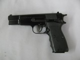7633 Browning HI Power 9mmmade in Belguim assembled in Portugal, 3 magazines holds 13 rounds each, Crimson trace lazer in grips, original grips incl - 5 of 12