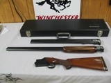 7645 Winchester 101 Waterfowler 12 gauge 32 inch barrels winchoke mod/full, 24 inch barrels cyl/cyl, all serial numbers match. vent rib, single trigge - 1 of 15
