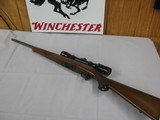 7650 Ruger 77/22- 22LR W/ Bushnell 2.5-8 Scope, amazing bluing, checkered stock, Rotary magazine, 99% condition - 1 of 12