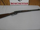 7657 Winchester Model 94, 30/30, 1941 mfg, lever action, adjustable rear sight, bull plate, 99% condition - 1 of 12