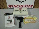 7663 Ruger LCP 380 Auto, Blue, 2,75 barrel, rear serrated slide, blade front and integral notch rear sight, 6 round Mag, new in box with papers - 1 of 6