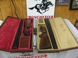 7701 Winchester DOUBLE GUN SET HEAVY DUCK AND LIGHT DUCK BOTH S/N 135. only 500 mfg and these 2 guns are same serial number #135.
12 gauge 30 inch ba - 2 of 24