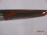 7706 Winchester 23 Pigeon XTR 20 gauge 26 inch barrels 2 3/4&3 inch chamb ers,ic/mod, round knob, vent rib, ejectors, Winchester butt plate, rose and - 13 of 16