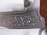 7717 Winchester 23 Pigeon 20 gauge 28 inch barrels 2 3/4& 3inch chambers, mod and full,rose and scroll coin silver engraved receiver, single select tr - 8 of 15