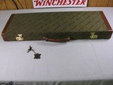 7727 Winchester 23 Classic 20 gauge 26 inch barrels ic and mod, ejectors, vent rig, single select gold trigger, Winchester pad, Winchester case