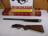 7767
Winchester 101 28 gauge 26 inch barrels skeet/skeet, 2 3/4 chambers, pistol grip with cap, Winchester box serialized to the gun, early good one - 1 of 14