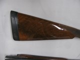 7809
Winchester 23 Golden Quail 410 ga 26 inch barrels mod/full straight grip, ejectors,solid
rib,quail and dog engraved on coin silver receiver, Wi - 4 of 14