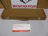 7809
Winchester 23 Golden Quail 410 ga 26 inch barrels mod/full straight grip, ejectors,solid
rib,quail and dog engraved on coin silver receiver, Wi