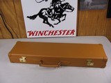7812
Winchester Parker reproduction light brown leather case, 20GA Very hard to find, brand new, NOS, with keys, will hold up to 27