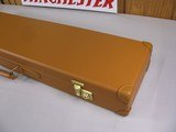 7813
Winchester Parker reproduction light brown leather case, 20 GA Very hard to find, brand new, NOS, with keys, will hold up to 27