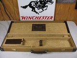 7843Winchester Golden Quai Case with key and hang tag. Will take 27