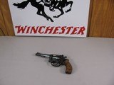 7554 Smith and Wesson 34-1 , 22LR Blued, Wood Grips 99% condition, 4