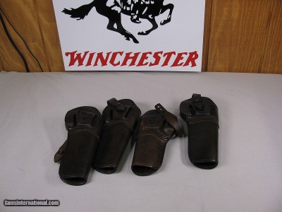 7871  4 Leather colt revolver holsters. Snap closure, Like new