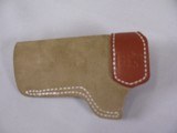 7876
De Santis Holster- 106/85, Soft tuck holster. Like new. - 2 of 4