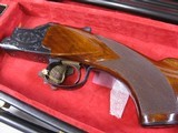 7880
Winchester 101 field 28G, 28 Barrels, M/F, 99% Condition, A+ Walnut, Pistol Grip, Butt Plate, Vent Rib, As New in Case, Beautiful Black with re - 3 of 16