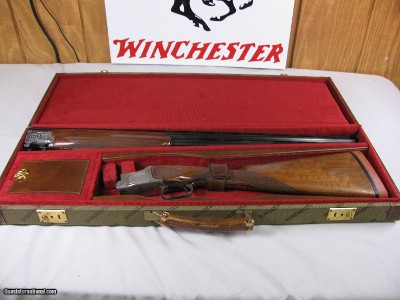7845  Winchester 101 Pigeon Lightweight, 28 GA, 28 Inch Barrels, IC/IM, Straight grip, with Winchester green case,   Vent rib, Quail Engraved on coin