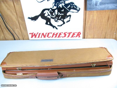 7909   Parker reproduction by Winchester DHE 20 gauge, 26 inch barrels, 2 3/4 chambers, ic/mod, fixed chokes, straight grip,  Skeleton butt plate, sin