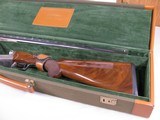 7923
Winchester 23 Pigeon XTR 20 gauge, Green hard case! With keys. Has 28 inch barrels 2 3/4 & 3 inch chambers, M/F, 14 1/8 LOP, round knob, vent ri - 21 of 22