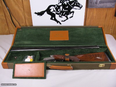 7923
Winchester 23 Pigeon XTR 20 gauge, Green hard case! With keys. Has 28 inch barrels 2 3/4 & 3 inch chambers, M/F, 14 1/8 LOP, round knob, vent ri