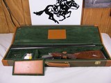 7923
Winchester 23 Pigeon XTR 20 gauge, Green hard case! With keys. Has 28 inch barrels 2 3/4 & 3 inch chambers, M/F, 14 1/8 LOP, round knob, vent ri