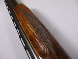 7931
Winchester 101 20 GA, 2 3/4 and 3”, Mod/Full. 14” LOP, 28” Barrels, It has the single brass bead as the early ones did! Pistol Grip with the red - 15 of 17