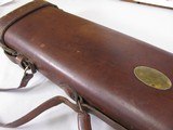 7936
Leather Shotgun/Rifle case. Really nice divided leather case. One of the straps has split, top and bottom can be opened, they ends are still nic - 3 of 15