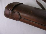 7936
Leather Shotgun/Rifle case. Really nice divided leather case. One of the straps has split, top and bottom can be opened, they ends are still nic - 15 of 15