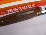 7937
Winchester 23 Pigeon XTR 12 GA, 3 IN chambers, 28” Barrels, Mod/Full, Fancy Tiger stripe wood, Decelerator Pad, 14 3/8 LOP, Single selective tri - 12 of 16