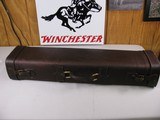 7911 Leather shotgun case. Really nice leather shotgun case. Can open case from either side. Really nice soft blue interior. Leather is still nice and