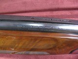 7941
Winchester 101 Super Pigeon 12 GA, 27” Barrels, 7 Winchokes (SK, IC, M, IM, 2 Full) 2 pouches and wrench, 7 Gold Images, 2 gold ducks left, gold - 14 of 21