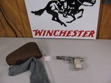 7949Colt 1903 Pocket Hammerless Pocket pistol, Manufactured in 1919, 32 ACP, Custom Nickel Refinish, Pearlite Grips. One Magazine, Gun sock and soft - 1 of 10
