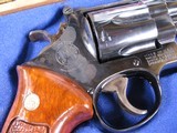 7943Smith and Wesson25-5, 45 Long Colt, Goncalo Alves Grips, Blue Finish 4” Barrell, Wood Presentation Case with Tools, Blemish on Side Plate See - 4 of 15