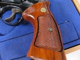 7943Smith and Wesson25-5, 45 Long Colt, Goncalo Alves Grips, Blue Finish 4” Barrell, Wood Presentation Case with Tools, Blemish on Side Plate See - 9 of 15