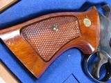 7943Smith and Wesson25-5, 45 Long Colt, Goncalo Alves Grips, Blue Finish 4” Barrell, Wood Presentation Case with Tools, Blemish on Side Plate See - 3 of 15