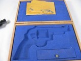 7943Smith and Wesson25-5, 45 Long Colt, Goncalo Alves Grips, Blue Finish 4” Barrell, Wood Presentation Case with Tools, Blemish on Side Plate See - 13 of 15