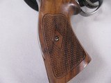 7950Smith and Wesson 647, 17 HMR, 8 3/8 Barrel, Rosewood Grips, Stainless Steel Finish, MFG 2004, Extra set of Original Hogue Grips, Bushnell Trophy - 10 of 14