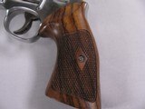 7950Smith and Wesson 647, 17 HMR, 8 3/8 Barrel, Rosewood Grips, Stainless Steel Finish, MFG 2004, Extra set of Original Hogue Grips, Bushnell Trophy - 2 of 14