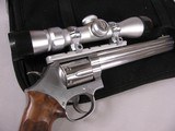 7950Smith and Wesson 647, 17 HMR, 8 3/8 Barrel, Rosewood Grips, Stainless Steel Finish, MFG 2004, Extra set of Original Hogue Grips, Bushnell Trophy - 11 of 14