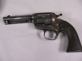 7947
Colt Bisley, MFG 1912, 32 WCF, 4 3/4 Barrel, Hard Rubber Grips, Comes with a soft case. - 2 of 14