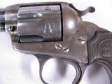 7947
Colt Bisley, MFG 1912, 32 WCF, 4 3/4 Barrel, Hard Rubber Grips, Comes with a soft case. - 5 of 14