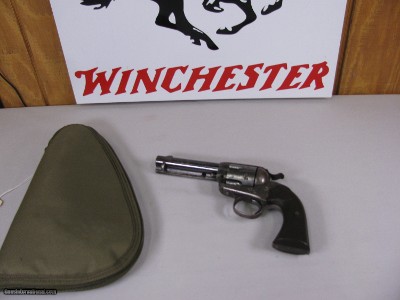 7947
Colt Bisley, MFG 1912, 32 WCF, 4 3/4 Barrel, Hard Rubber Grips, Comes with a soft case.