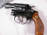 7944
Smith and Wesson 36, 38 Special, Blue Finish, Walnut Grips, MFG 1979, Original Blue Box, Paperwork, Tools, sock and a soft case. - 2 of 10